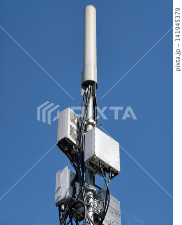 A high-speed data tower with 5G technology in an urban environment A high-speed data tower with 5G technology in an urban environment 141945379