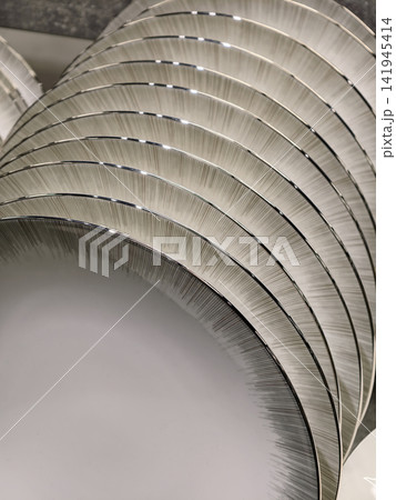 Kitchen tableware displayed in supermarket aisle with neatly arranged plates and modern ceramic dining dish assortment 141945414
