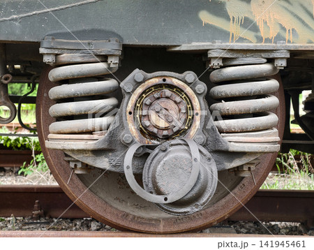 Freight wagon bogie featuring bearing wheel and spring suspension designed to support heavy cargo loads on railway transportation infrastructure 141945461