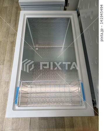 Horizontal freezer, perfect for home or small business use, available at a home appliance superstore Horizontal freezer, perfect for home or small business use, available at a home appliance superstore 141945494