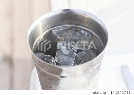 ice bucket in a bar ice bucket in a bar 141945731