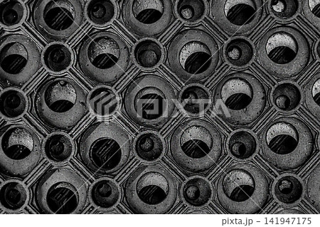 Dark black round rubber pattern cover floor rug structure backdrop circle mat rough material 141947175