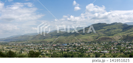 Scenic View of a Small Town in a Green Valley 141951025