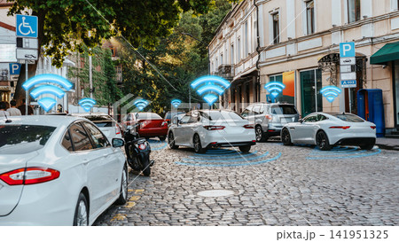 Surveillance technology tracks vehicles in a busy city area on a clear day Surveillance technology tracks vehicles in a busy city area on a clear day 141951325