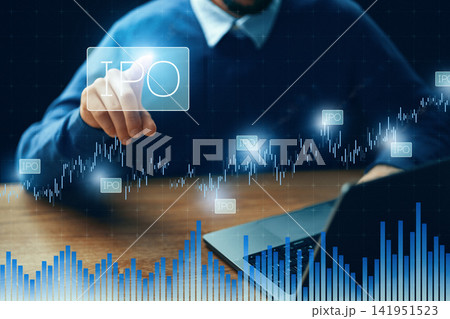 Investors tracking the initial public offering IPO process on a laptop during stock market activities in a financial office 141951523