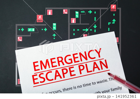 Emergency evacuation plan showing routes and exits for safety in a building Emergency evacuation plan showing routes and exits for safety in a building 141952361