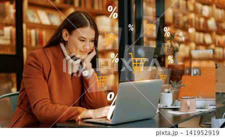 Online shopping experience in a cafe during late morning hours Online shopping experience in a cafe during late morning hours 141952919