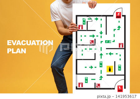 Understanding the emergency evacuation plan for a building with clear exit routes Understanding the emergency evacuation plan for a building with clear exit routes 141953617
