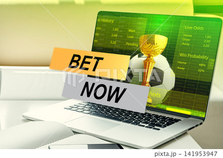 Sports betting options displayed on a laptop screen during a match day Sports betting options displayed on a laptop screen during a match day 141953947