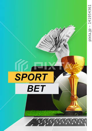 Sports betting on a laptop with cash and a trophy in view Sports betting on a laptop with cash and a trophy in view 141954361