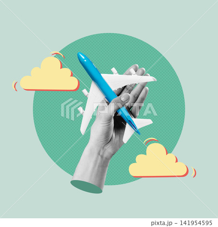 Holding a model airplane with a hand against a green background and clouds Holding a model airplane with a hand against a green background and clouds 141954595