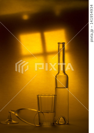 Still life with a bottle, a glass and a broken glass Still life with a bottle, a glass and a broken glass 141954934