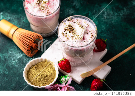 Strawberry matcha latte smoothie cocktail 141955388