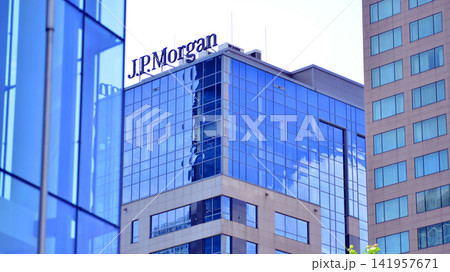 Warsaw, Poland. 25 July 2026. Urban landscape. Neon sign with the inscription: J.P. Morgan. Warsaw, Poland. 25 July 2026. Urban landscape. Neon sign with the inscription: J.P. Morgan. 141957671