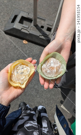 Mochi is a Japanese cake made from glutinous rice, pounded until it is soft and sticky, then shaped into a round shape. Various colors of mochi cake, traditional Japanese food 141958154
