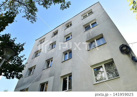 Perspective view of flat of blocks from Communist period, worn out concrete buildings in Eastern Europe Perspective view of flat of blocks from Communist period, worn out concrete buildings in Eastern Europe 141959025