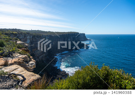 Dramatic coastal cliffs along Fairfax Walk in Manly, Sydney, Australia 141960388