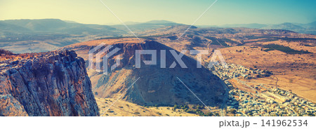 View from Arbel cliff to arab village Wadi al-Hammam, Galilee, Israel 141962534