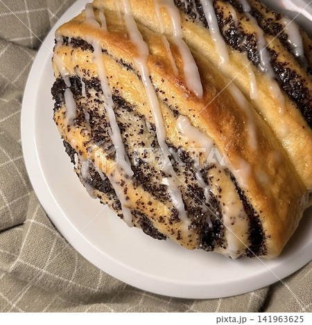 Soft chocolate cinnamon roll with rich cocoa swirls and a tender, fluffy texture. Sweet, aromatic, and indulgent, offering a warm bakery feel perfect for cozy dessert moments. Soft chocolate cinnamon roll with rich cocoa swirls and a tender, fluffy texture. Sweet, aromatic, and indulgent, offering a warm bakery feel perfect for cozy dessert moments. 141963625