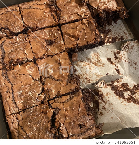 Rich, gooey fudge brownies with a dense, chocolatey center and a perfectly crisp top. Ideal for chocolate lovers craving a satisfying, indulgent treat. Rich, gooey fudge brownies with a dense, chocolatey center and a perfectly crisp top. Ideal for chocolate lovers craving a satisfying, indulgent treat. 141963651