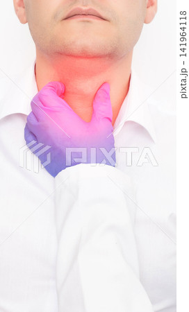 Medical professional gloved hand palpating neck region of man showing inflamed throat during diagnostic examination for thyroid or tonsil issue, vertical photo Medical professional gloved hand palpating neck region of man showing inflamed throat during diagnostic examination for thyroid or tonsil issue, vertical photo 141964118