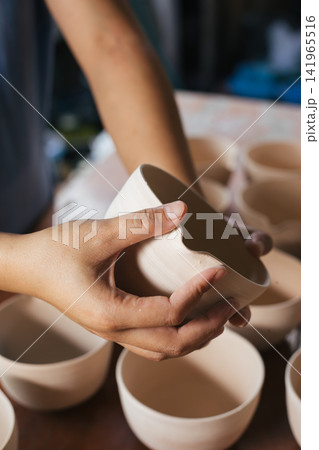 The process of creating pottery. The process of creating pottery. 141965516