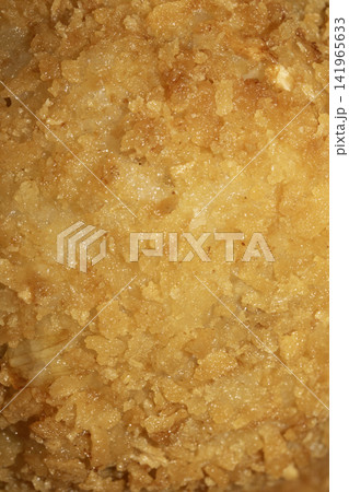 Close up of golden batter breadcrumbs close up Close up of golden batter breadcrumbs close up 141965633