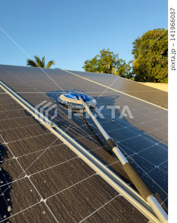 Maintenance cleaning of solar panel roof Maintenance cleaning of solar panel roof 141966087