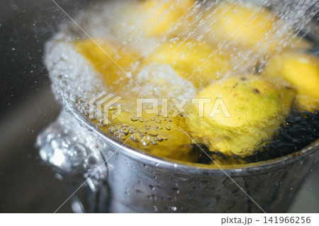 Washing fresh lemons Washing fresh lemons 141966256
