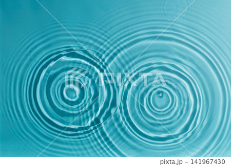 Ripple effect conceptual background with twin water circles Ripple effect conceptual background with twin water circles 141967430