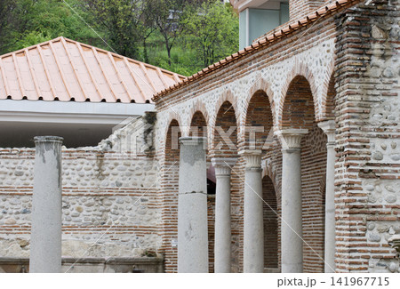 Ancient Roman stone arches and marble columns of historic architecture Ancient Roman stone arches and marble columns of historic architecture 141967715