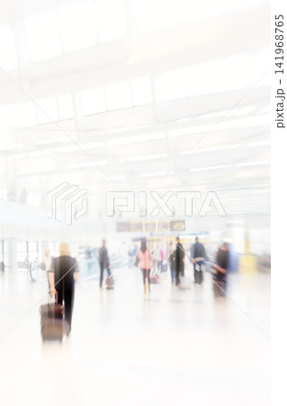 People, travel and airport in motion lens with luggage as transport to commute with speed or hurry for vacation. Global, crowd and walking in rush from lobby with suitcase for holiday as passenger People, travel and airport in motion lens with luggage as transport to commute with speed or hurry for vacation. Global, crowd and walking in rush from lobby with suitcase for holiday as passenger 141968765