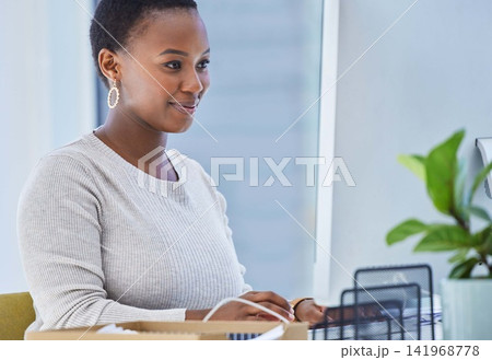 Computer, smile and black woman in office for creative research with copywriting project. Technology, happy and professional African female writer typing email for content on desktop in workplace. Computer, smile and black woman in office for creative research with copywriting project. Technology, happy and professional African female writer typing email for content on desktop in workplace. 141968778