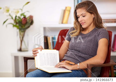 Novel, relax or woman reading book in home for alone time, rest break or studying information in Spain. Girl, chair or female person with fiction story, page or peace for knowledge, fantasy or hobby Novel, relax or woman reading book in home for alone time, rest break or studying information in Spain. Girl, chair or female person with fiction story, page or peace for knowledge, fantasy or hobby 141968873