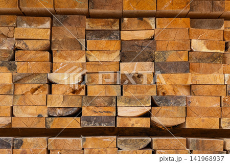 Close-Up of Stacked Lumber with Natural Grain Patterns Close-Up of Stacked Lumber with Natural Grain Patterns 141968937