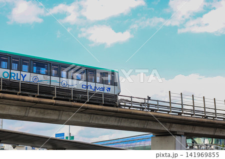 Automated airport shuttle train on elevated railway 141969855