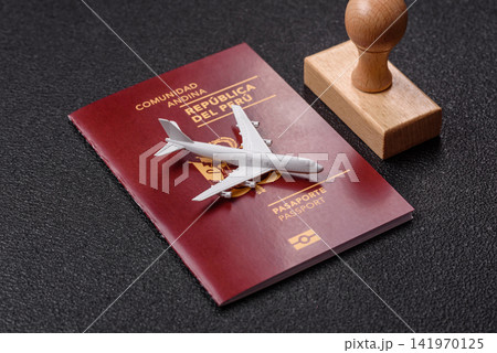 Peru, peruvian passport or id document with tickets for flight, border crossing. Peruvian passport 141970125
