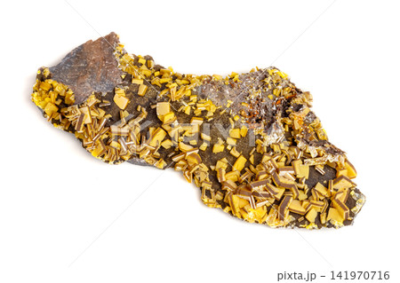 Macro mineral stone yellow Wulfenite on a white background Macro mineral stone yellow Wulfenite on a white background 141970716