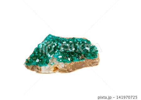 Macro mineral stone Dioptase silicate copper on a white background Macro mineral stone Dioptase silicate copper on a white background 141970725