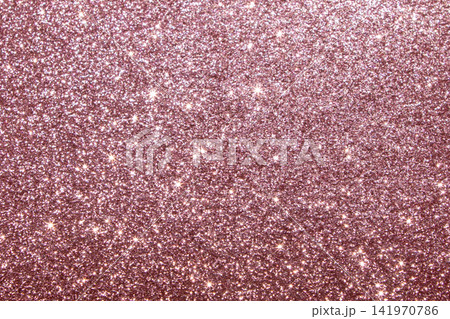 Rose gold glitter background with shimmering sparkle and elegant pink metallic texture Rose gold glitter background with shimmering sparkle and elegant pink metallic texture 141970786