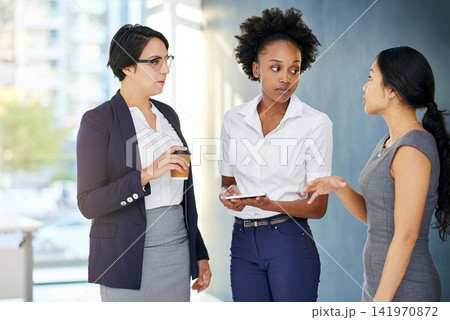 Employee, women and conversation at office for meeting with teamwork or collaboration on project. Diversity, discussion and chat in startup company for creativity with report, feedback and share idea 141970872