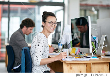 Portrait, woman and happy with notepad in office for career or job growth with opportunity. Employee, smile and satisfied with pride as graphic designer with computer, desk and notes for training Portrait, woman and happy with notepad in office for career or job growth with opportunity. Employee, smile and satisfied with pride as graphic designer with computer, desk and notes for training 141970894