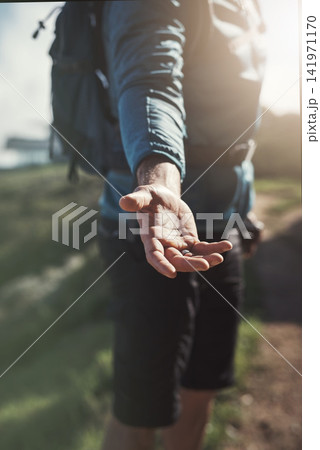 Hiking, help and fitness man with hand offer in nature pov for teamwork, support or forest exercise collaboration. Trust, challenge or hiker with reaching palm for adventure, come or guide invitation Hiking, help and fitness man with hand offer in nature pov for teamwork, support or forest exercise collaboration. Trust, challenge or hiker with reaching palm for adventure, come or guide invitation 141971170