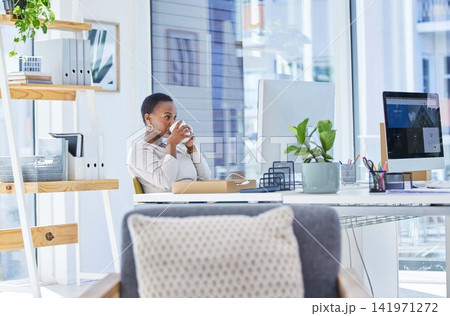 Coffee, business and black woman in office for drinking, planning report or review at desk. Computer, working and female employee with cup of tea for online editing, research article or reading email Coffee, business and black woman in office for drinking, planning report or review at desk. Computer, working and female employee with cup of tea for online editing, research article or reading email 141971272