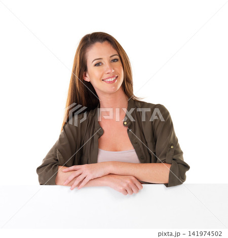 Mockup, portrait and woman with sign in studio for advertising, marketing or promotion. Smile, banner and confident female person with blank space poster, placard or board by white background. 141974502