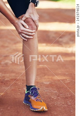 Knee pain, hands and sports person in training injury, fitness or fatigue for outdoor marathon. Athlete or runner stop running with leg, muscle and bone or joint for workout, race or exercise strain Knee pain, hands and sports person in training injury, fitness or fatigue for outdoor marathon. Athlete or runner stop running with leg, muscle and bone or joint for workout, race or exercise strain 141974614