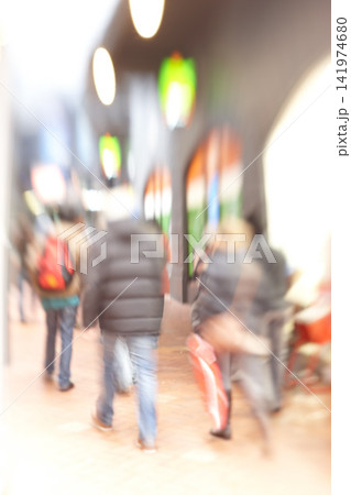 Blurred, city and crowd on street outdoor in London for population migration at night with light. Busy people, motion or walking on road for travel, journey or commute in urban society with buildings Blurred, city and crowd on street outdoor in London for population migration at night with light. Busy people, motion or walking on road for travel, journey or commute in urban society with buildings 141974680
