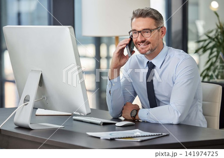 Mature, business and man with phone call in office for corporate, communication and company client. Executive, technology and conversation in workplace for contract agreement, deal and good news 141974725