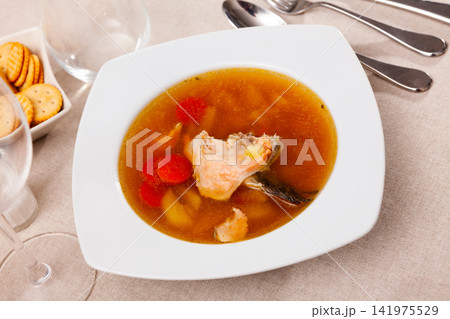 Salmon offal soup served in bowl 141975529