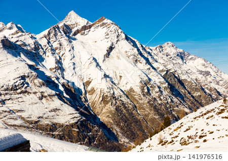 Winter alpine landscape near Zermatt with snow covered mountains, Switzerland Winter alpine landscape near Zermatt with snow covered mountains, Switzerland 141976516